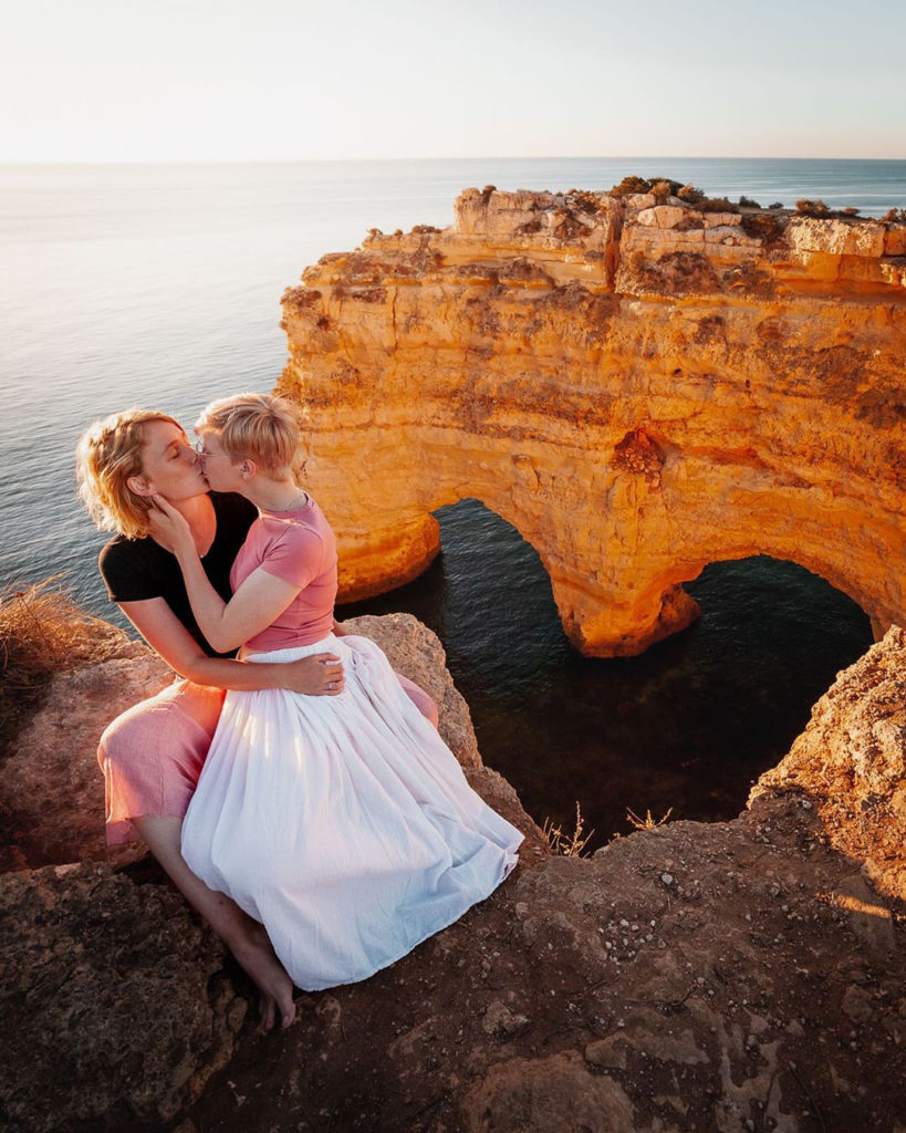 Couple of girls kissing in Lagos, Portugal