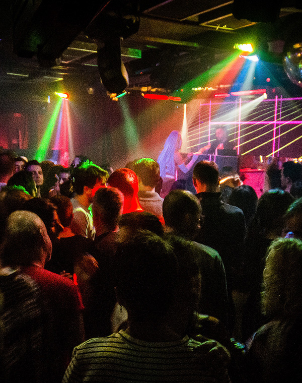 Crowd of people dancing at Trumps, Lisbon, Portugal